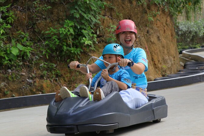 Family enjoying an outdoor mountain cart adventure in Phuket